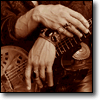 ''Treat Me Right'' Jewel Case Back Cover - Eric Sardinas' Hands by Jeff Dunas- Los Angeles, October 25, 1998